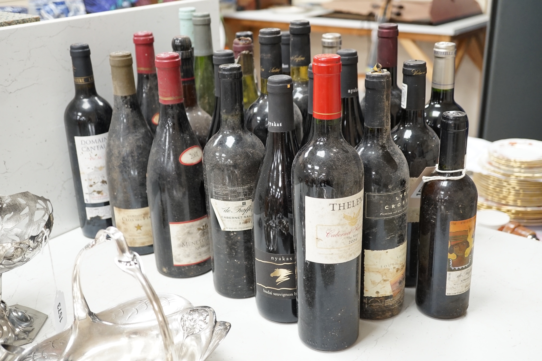 Twenty six various bottles of wine, sherry and port. Condition - storage unknown